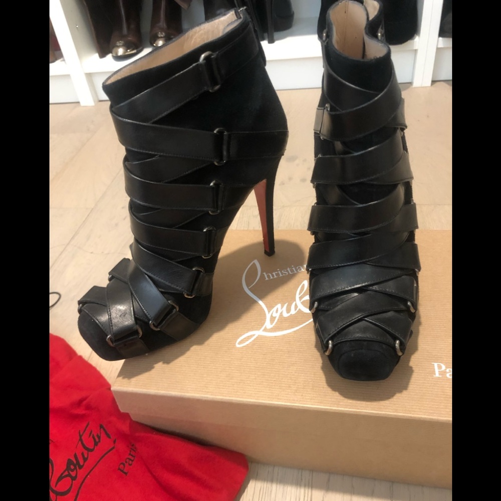 Christian Loboutin booties with side zipper. Excellent condition.authentic